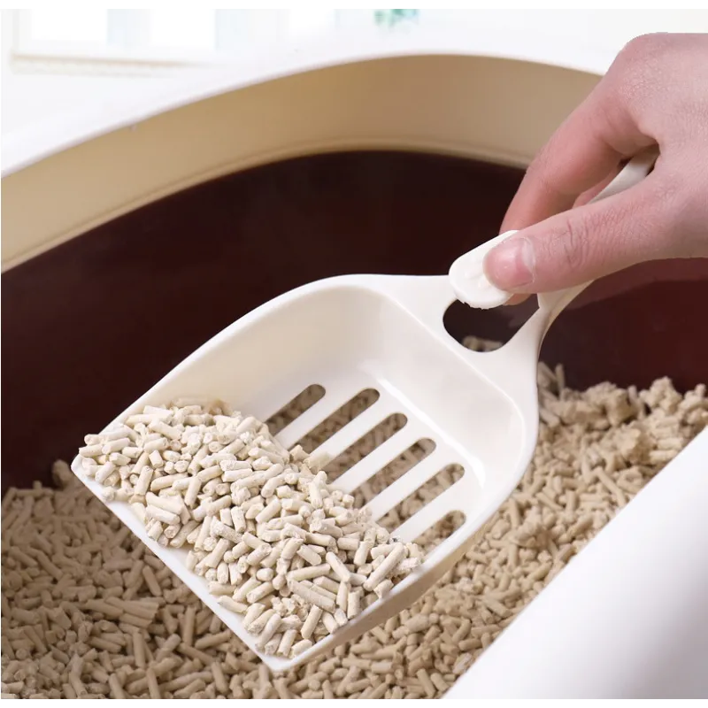 Durable & stylish cat head litter scoop for easy pet waste cleaning. Essential cat accessory.