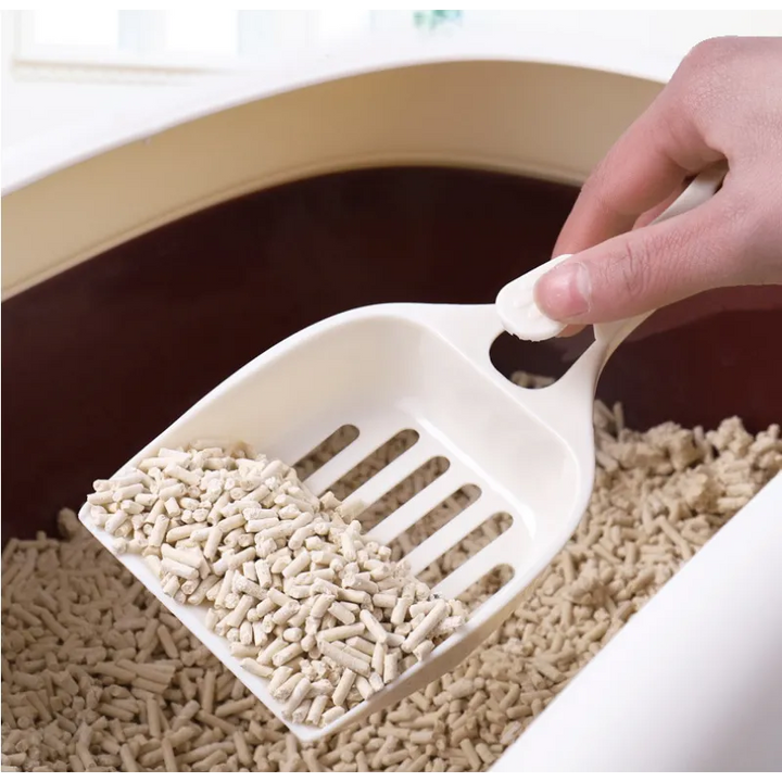 Durable & stylish cat head litter scoop for easy pet waste cleaning. Essential cat accessory.