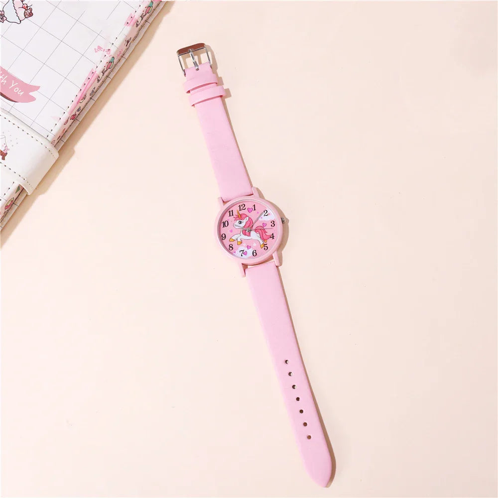 Enchanting unicorn cartoon watch for girls, featuring a comfortable and durable pink PU leather strap.