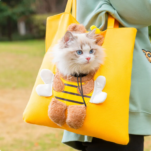 Cute dinosaur pet carrier for cats & small dogs, perfect for stylish & comfortable car travel.