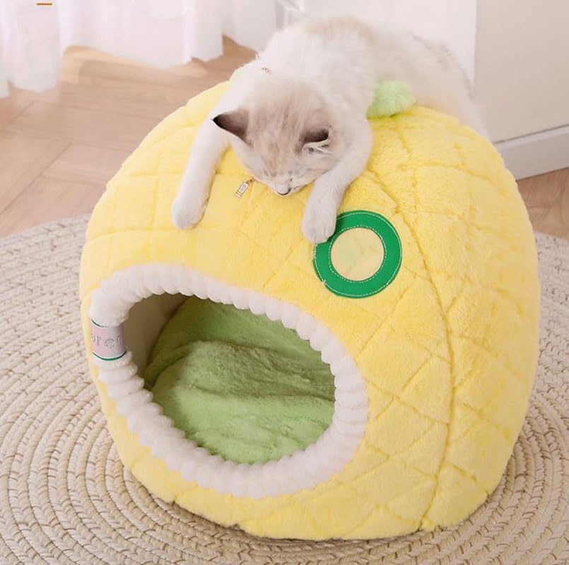 Vibrant yellow pineapple-shaped soft cat bed cave. Plush, comfortable pet furniture for feline sleeping.