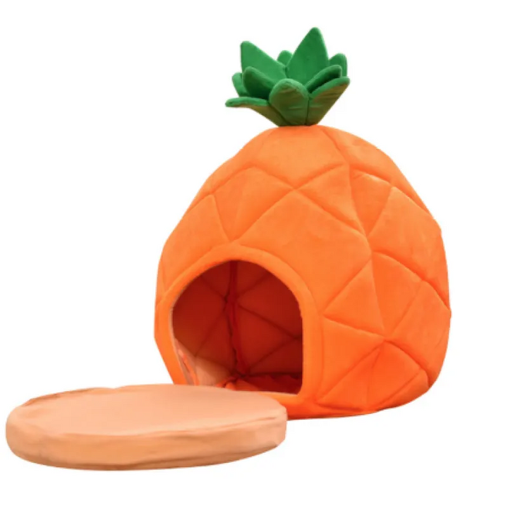 Cute pineapple design cat sleeping cave for cozy pet hideaway. Soft, warm cat bed accessory.