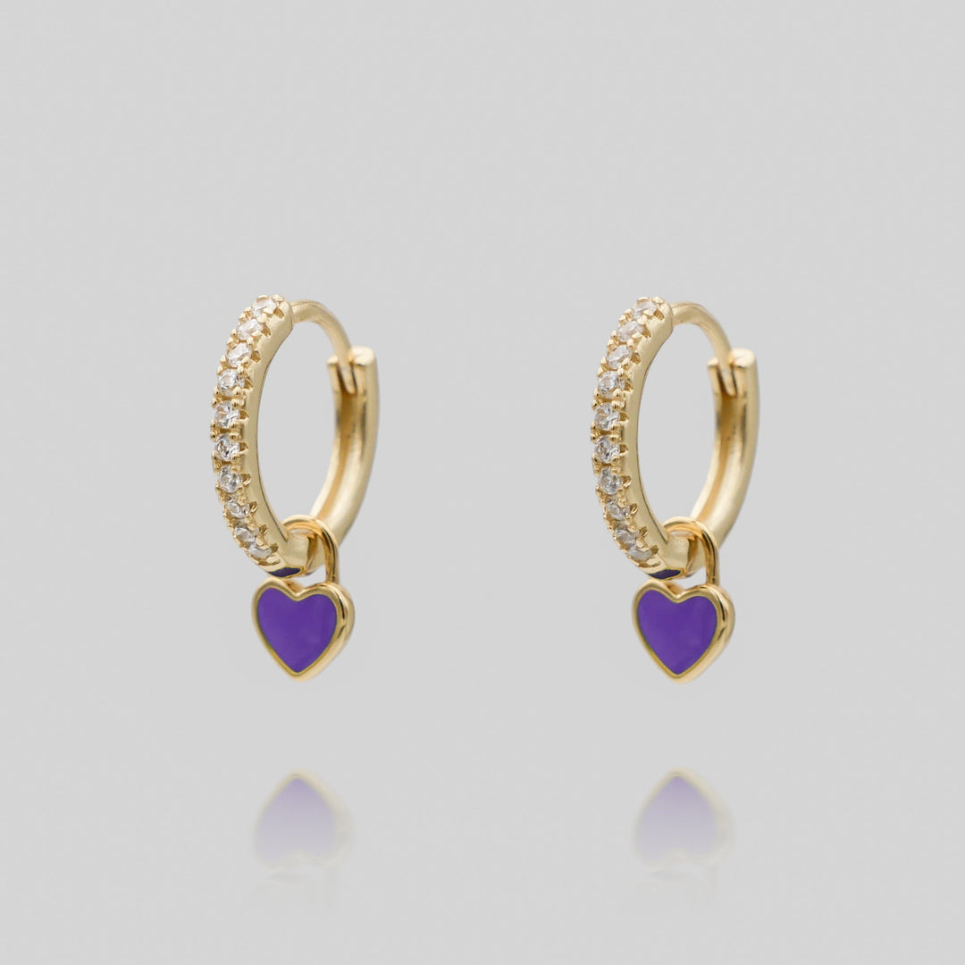 Fashionable gold plated dainty heart huggie hoop earrings, ideal for women.