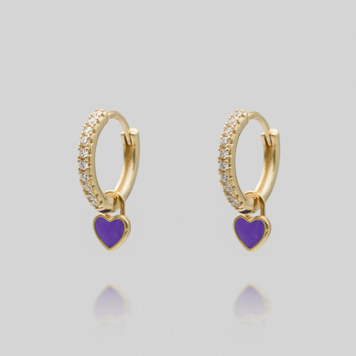 Fashionable gold plated dainty heart huggie hoop earrings, ideal for women.