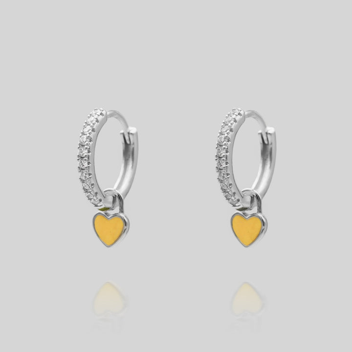 Delicate colorful heart huggie hoop earrings, playful women's dainty jewelry.