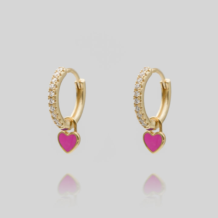 Silver plated dainty heart huggie hoop earrings, a charming accessory for women.