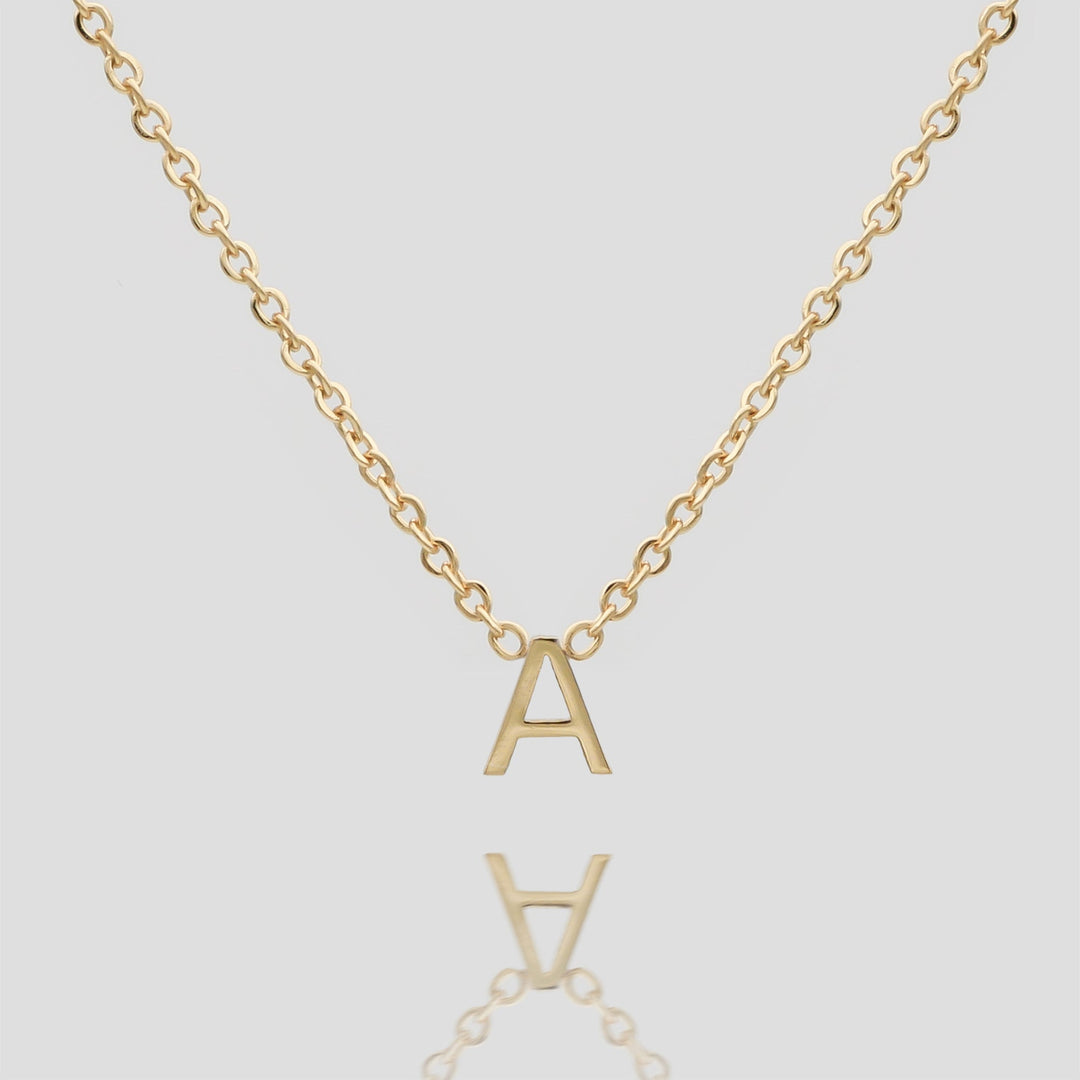 Dainty personalized initial necklace in gold for women.