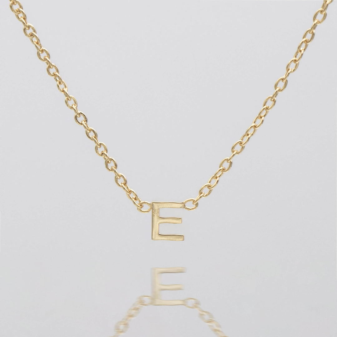 Women's gold custom initial necklace, personalized dainty gift.
