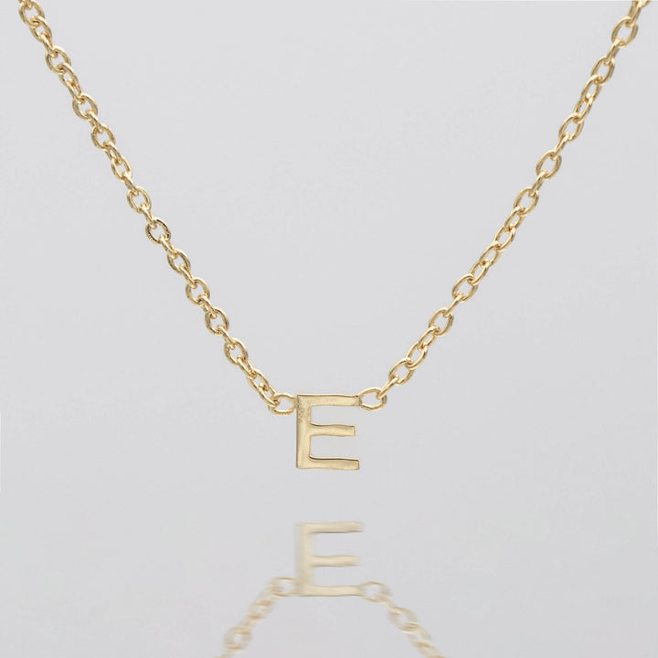 Women's gold custom initial necklace, personalized dainty gift.