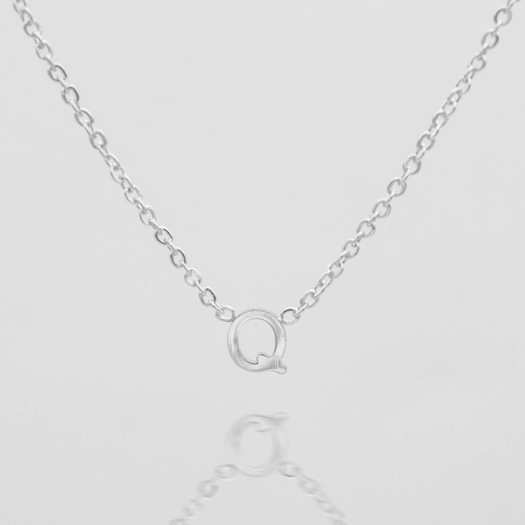Women's gold initial personalized necklace, elegant.