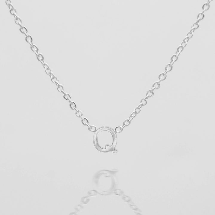 Women's gold initial personalized necklace, elegant.
