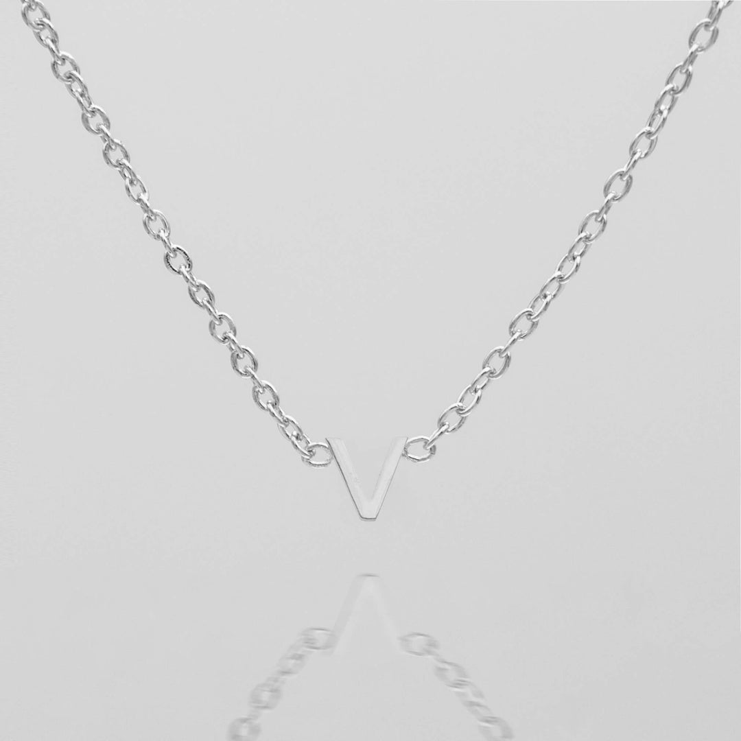 Custom silver dainty initial necklace for her.