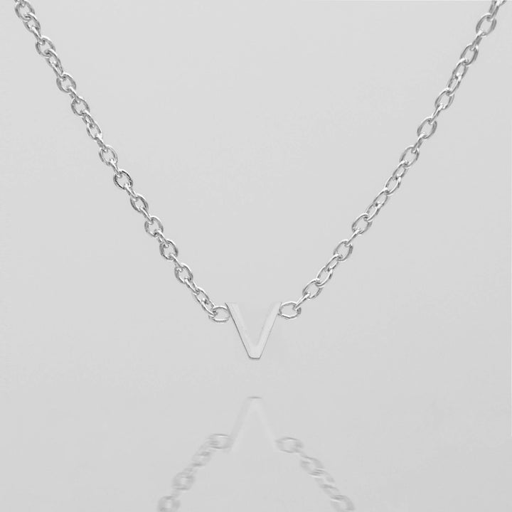 Custom silver dainty initial necklace for her.