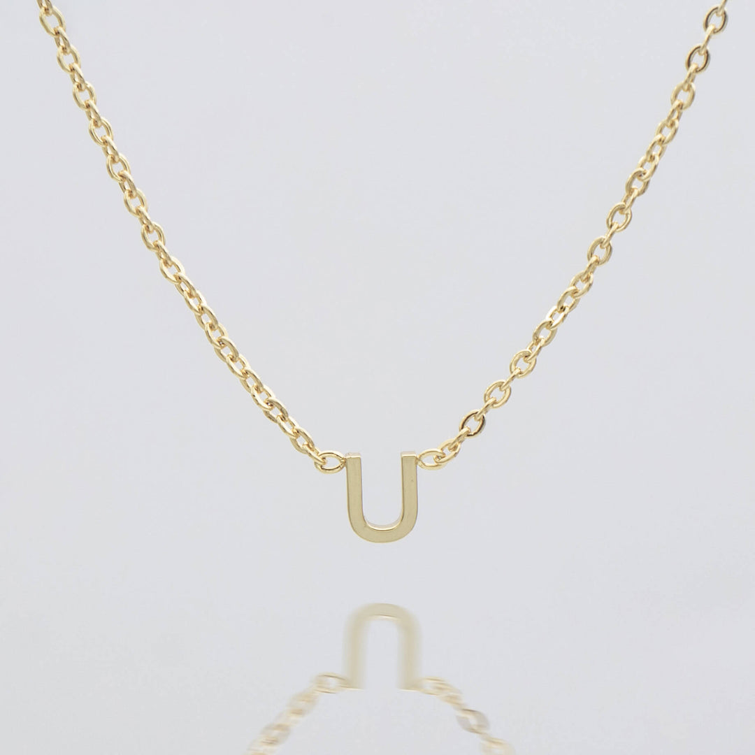 Women's gold initial necklace, custom dainty jewelry.