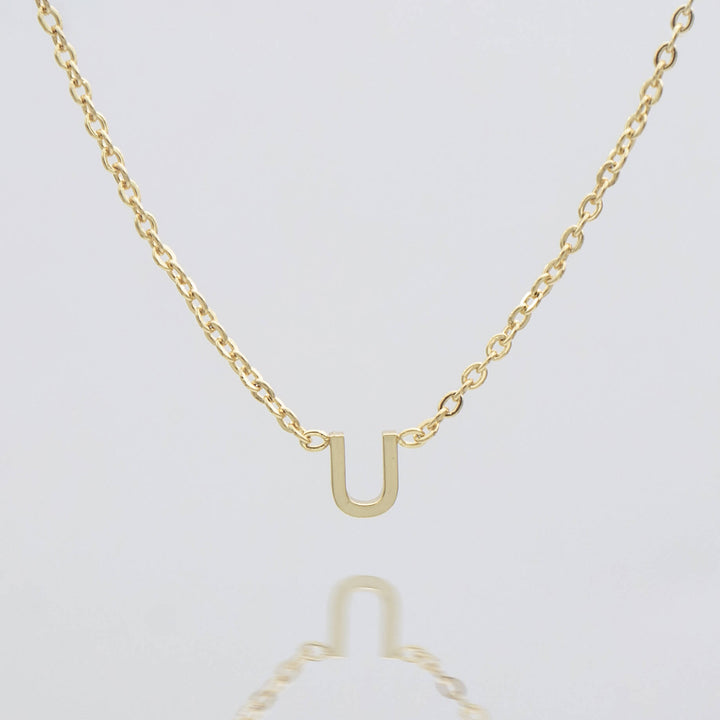 Women's gold initial necklace, custom dainty jewelry.