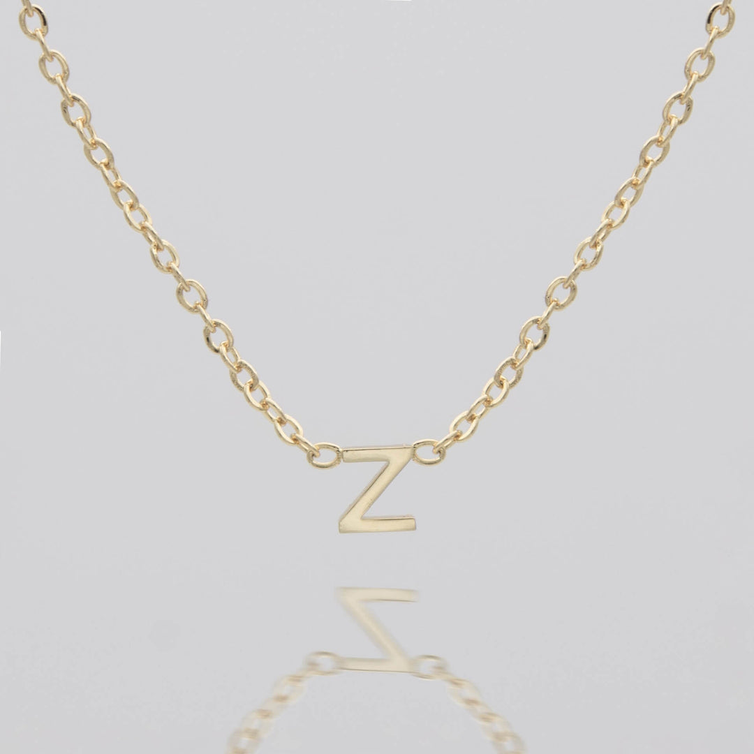 Personalized silver initial pendant, delicate women's gift.