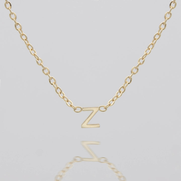Personalized silver initial pendant, delicate women's gift.