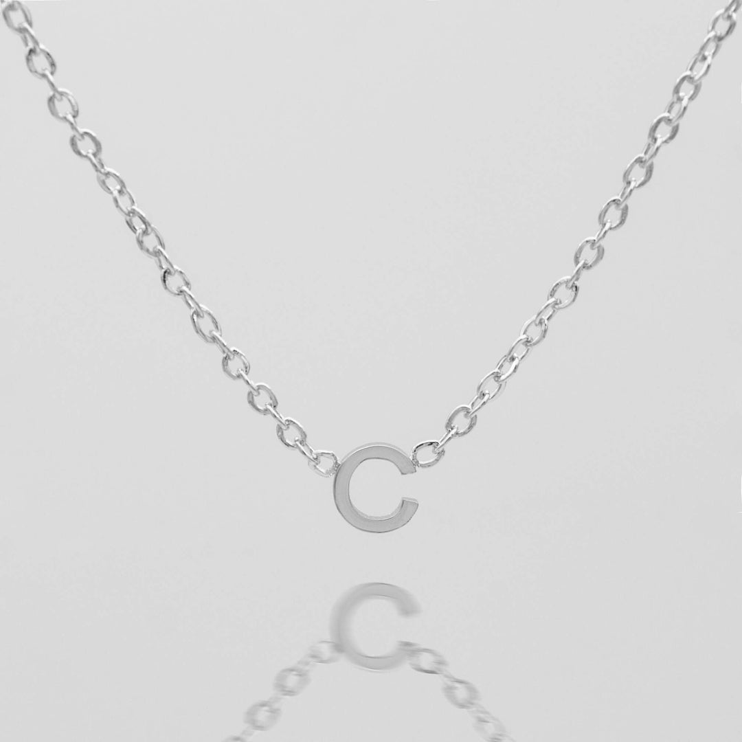 Silver personalized initial necklace, elegant women's pendant.