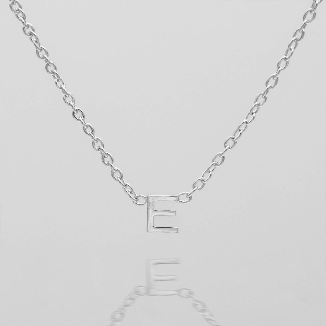 Women's silver personalized letter necklace, delicate gift.