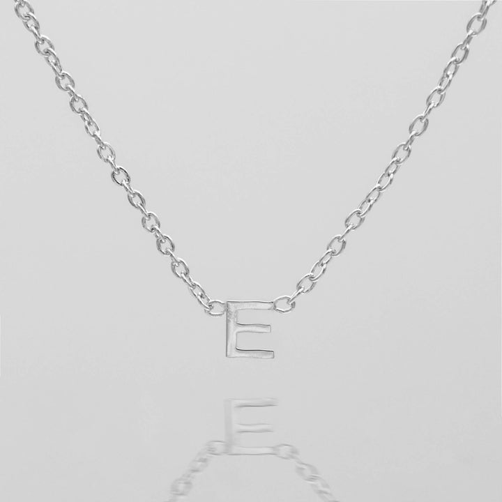 Women's silver personalized letter necklace, delicate gift.