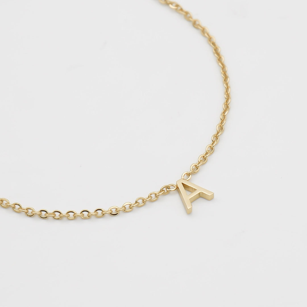 Elegant gold initial necklace, personalized women's jewelry.