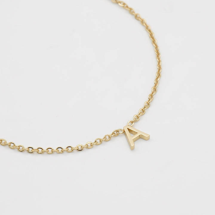 Elegant gold initial necklace, personalized women's jewelry.