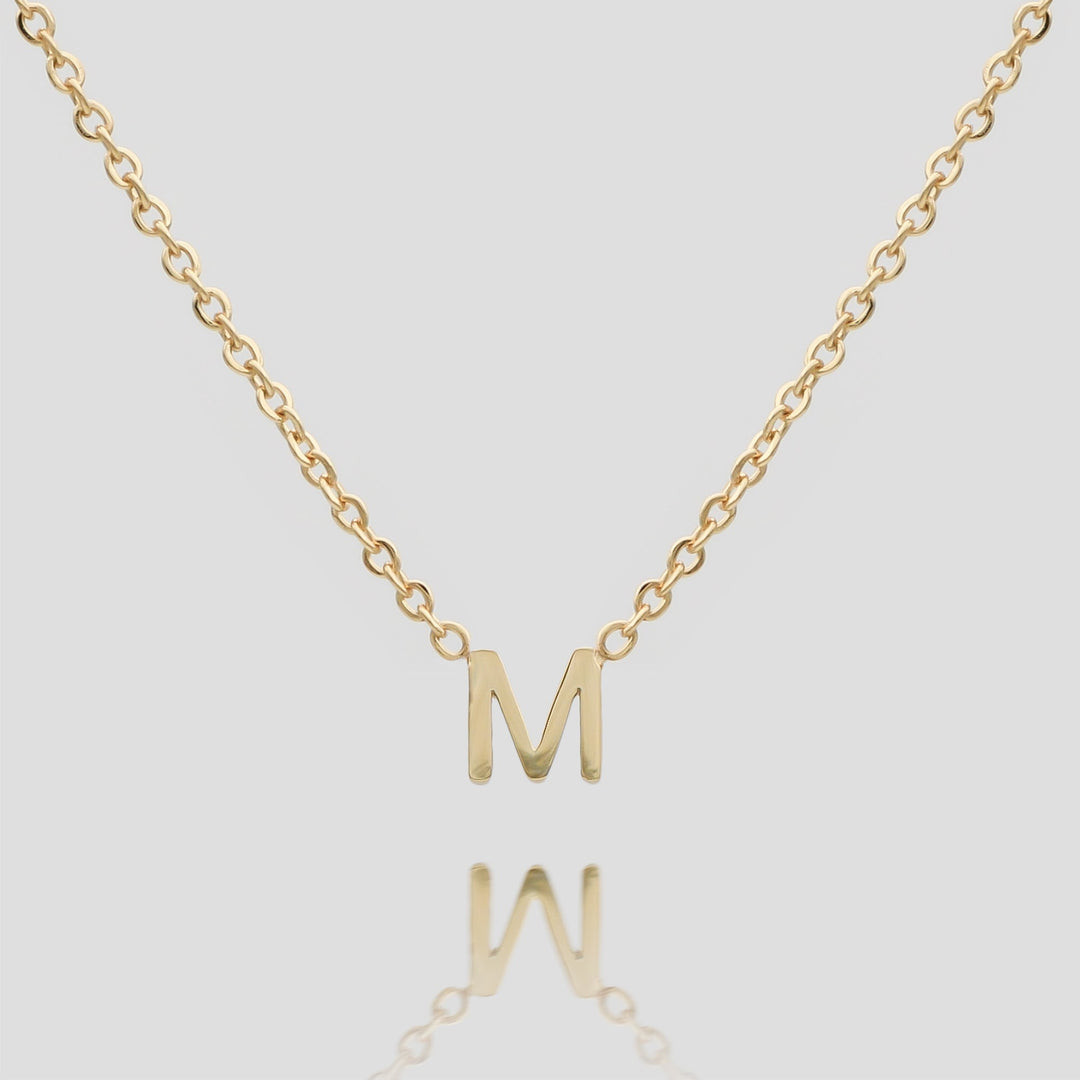 Personalized gold dainty initial pendant for women, custom jewelry.