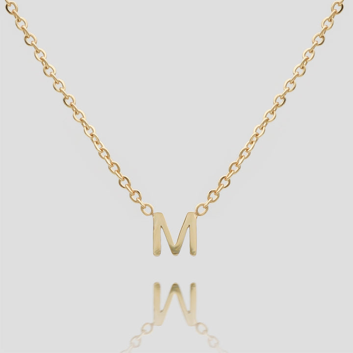 Personalized gold dainty initial pendant for women, custom jewelry.