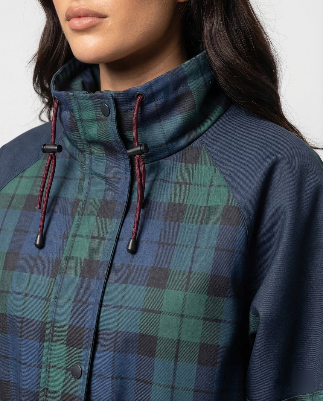 Relaxed fit dark blue plaid women's jacket, a stylish fall/winter outerwear piece for casual fashion.