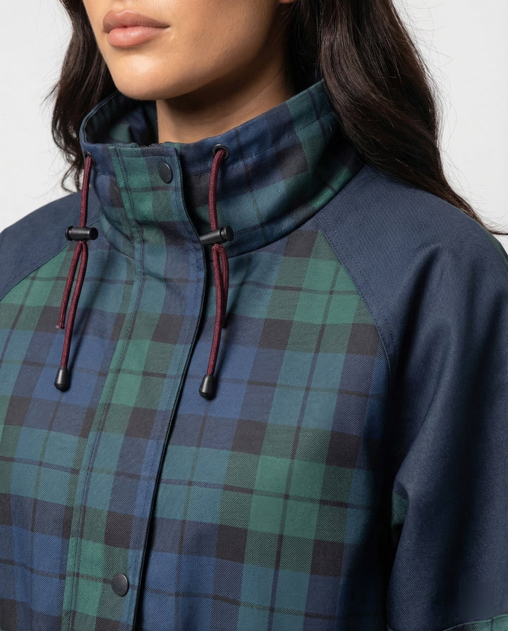 Relaxed fit dark blue plaid women's jacket, a stylish fall/winter outerwear piece for casual fashion.