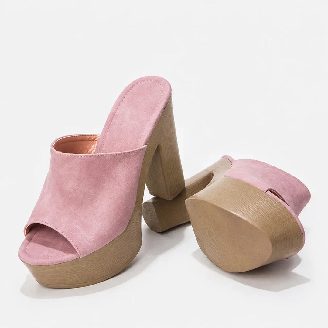 Fashionable dark blue platform sandals for women, chunky block heel and open-toe design, summer.