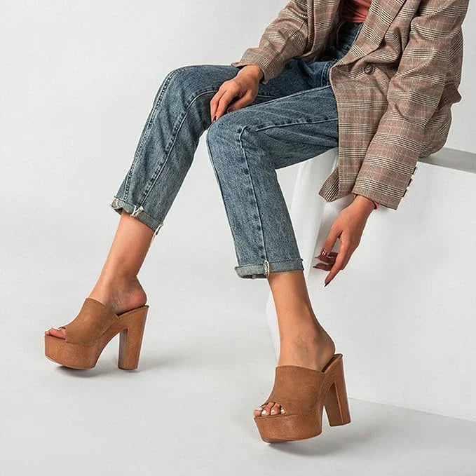 Women's dark blue platform heel sandals, chunky block heel provides stability and modern summer style.