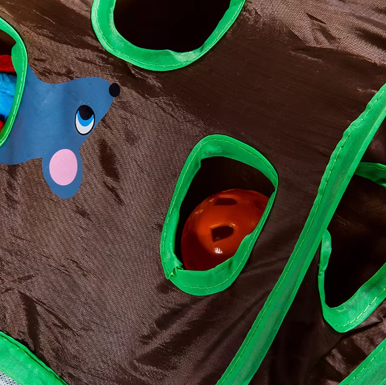 Cat's interactive dark brown playmat with tunnels for hide-and-seek and hunting enrichment.