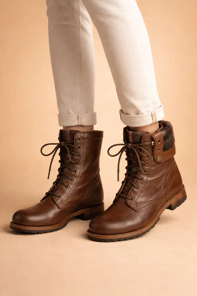 Stylish women's lace-up combat ankle boots in dark brown, offering versatile fashion & comfort.