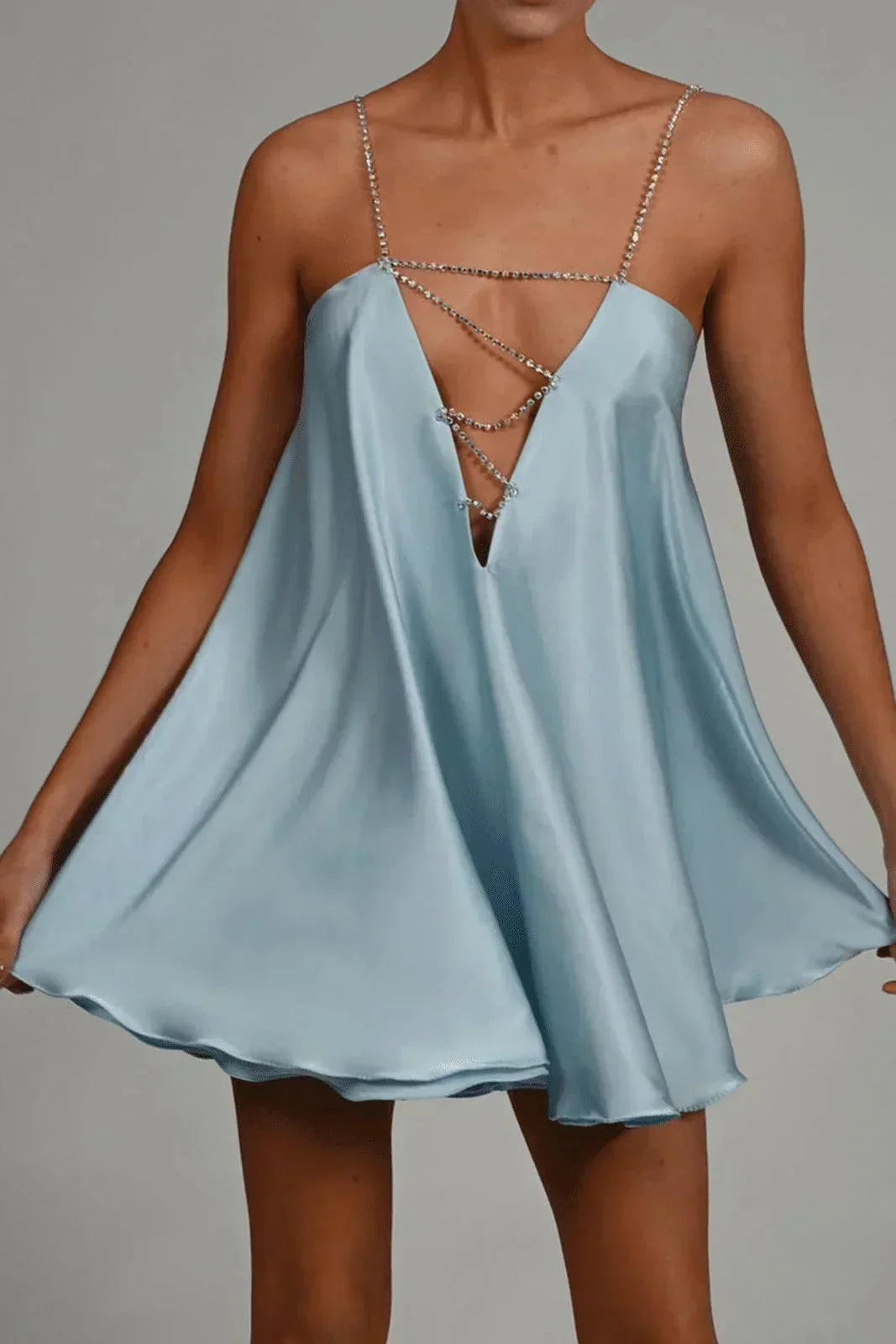 Fashionable women's backless mini party dress, dazzling and sleeveless, perfect for evening wear & special events.