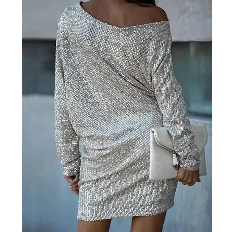 Sparkling women's sequin cocktail dress. Ideal for formal events.