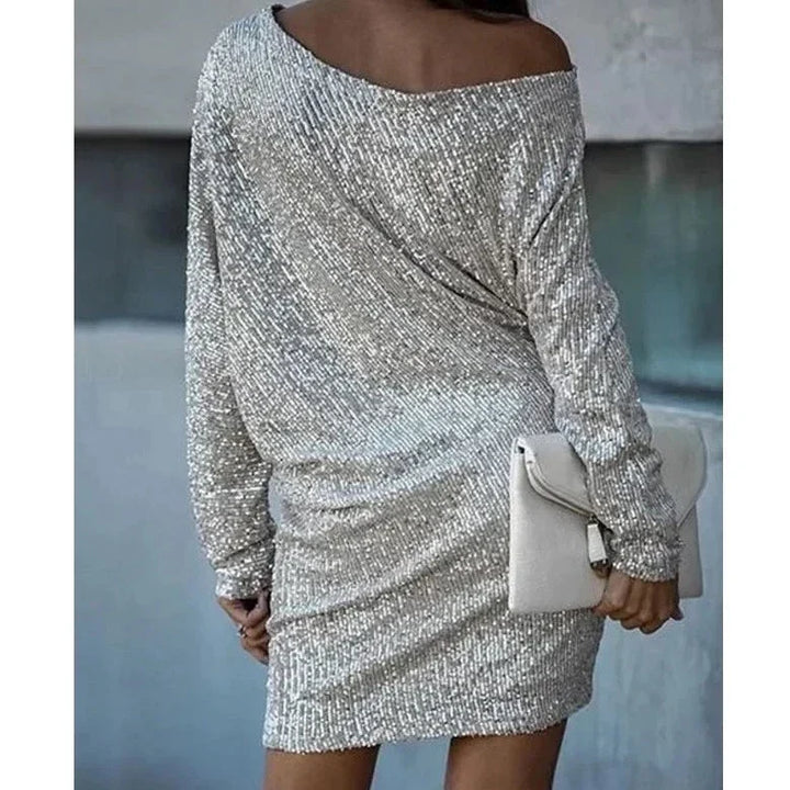 Sparkling women's sequin cocktail dress. Ideal for formal events.