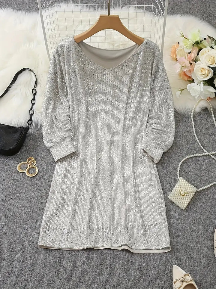 Glamorous sequin evening dress for women, dazzling party wear.