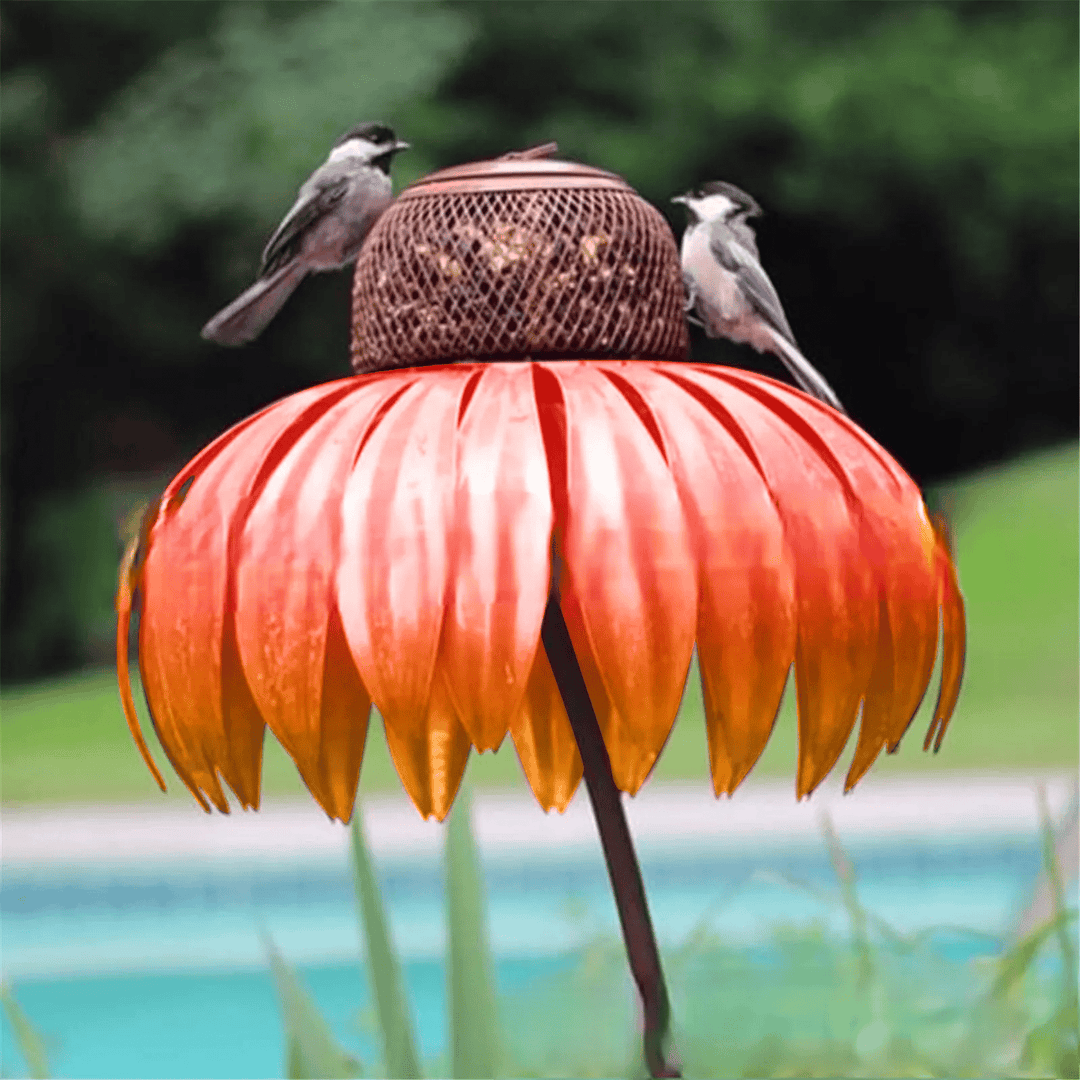 Sturdy metal bird feeder house shaped like a flower, ideal garden accessory.
