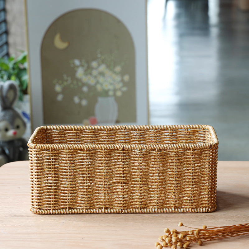 Light brown hand-woven rectangular storage basket for decorative home organization and clutter solution.