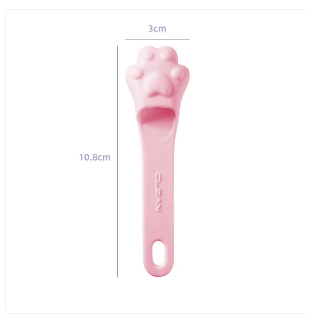 Cute paw design dog tongue scraper, a pet care tool for fresh breath and dental health. Easy grooming accessory.