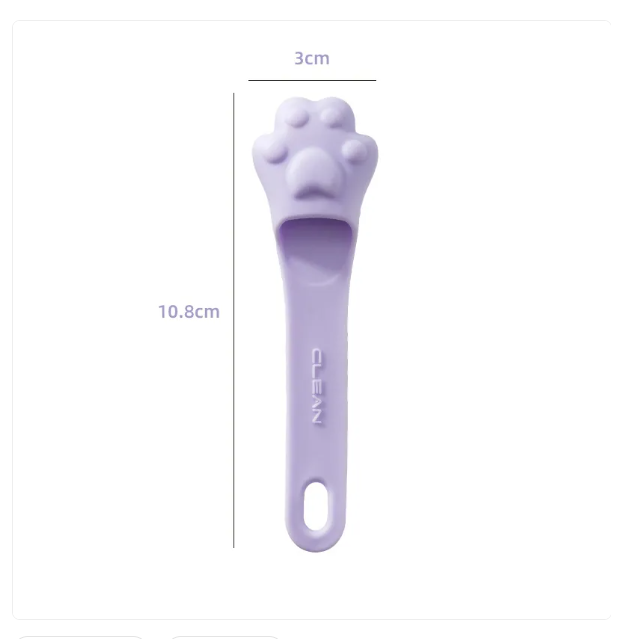 Gentle dog tongue scraper with paw handle. Promotes fresh breath and removes plaque for better canine dental health.