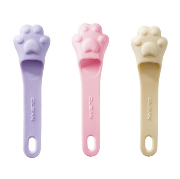 Easy-to-use dog tongue scraper featuring a paw design. Perfect for pet care, ensuring fresh breath & dental health.