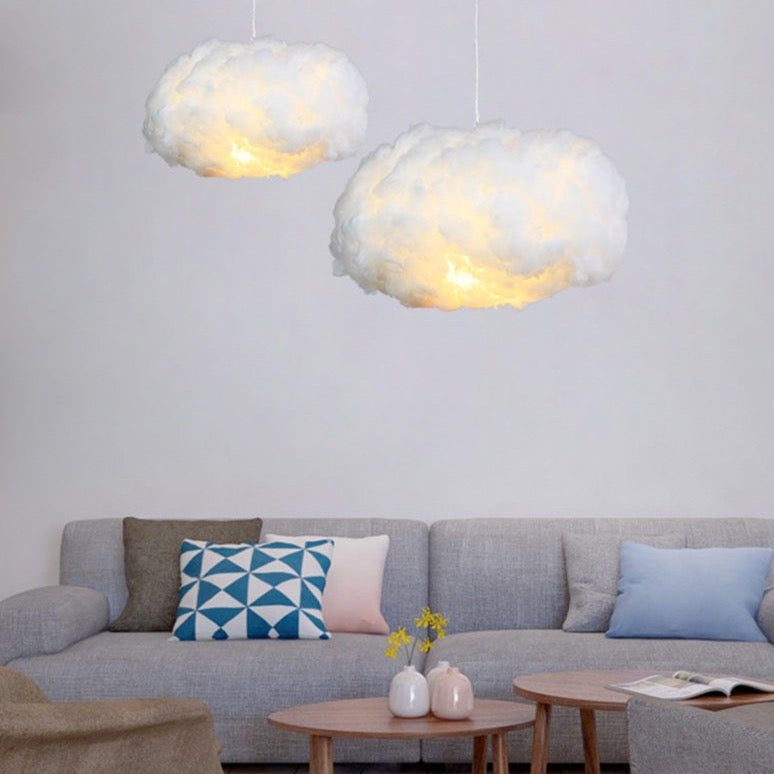 Unique cotton cloud ceiling lamp. Provides warm ambient light for nursery, bedroom or living room decor.