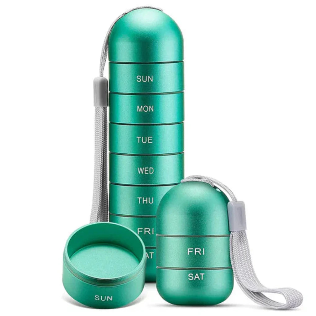 Compact aluminum weekly pill box with 7 compartments for daily supplement organization.