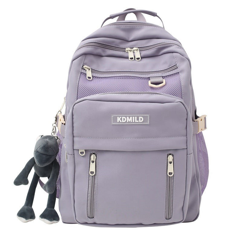 Stylish unisex multi-pocket school backpack in a lifestyle shot, great for modern travelers & daily essentials.