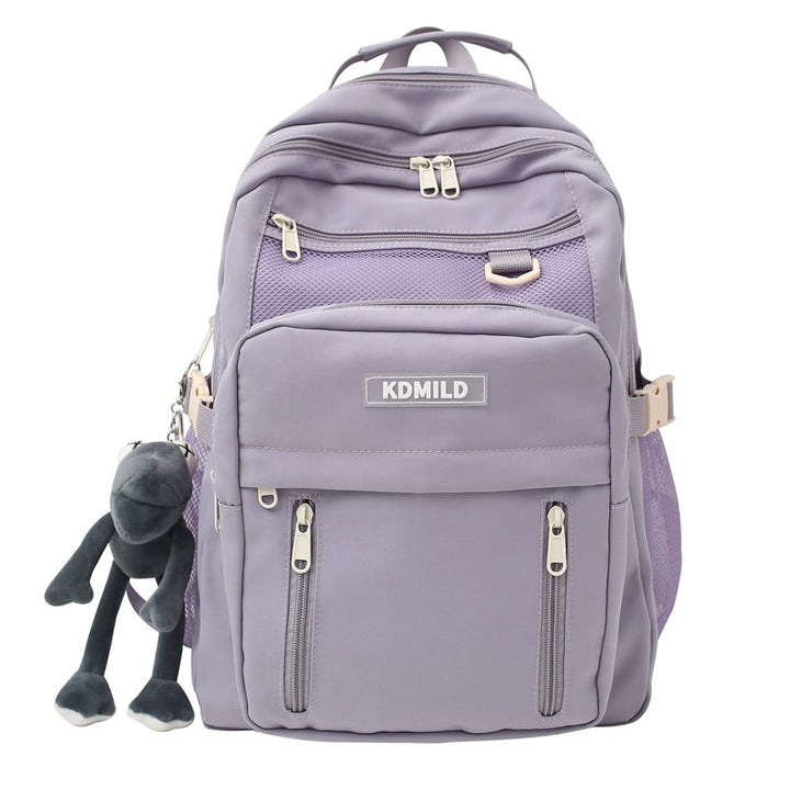 Stylish unisex multi-pocket school backpack in a lifestyle shot, great for modern travelers & daily essentials.
