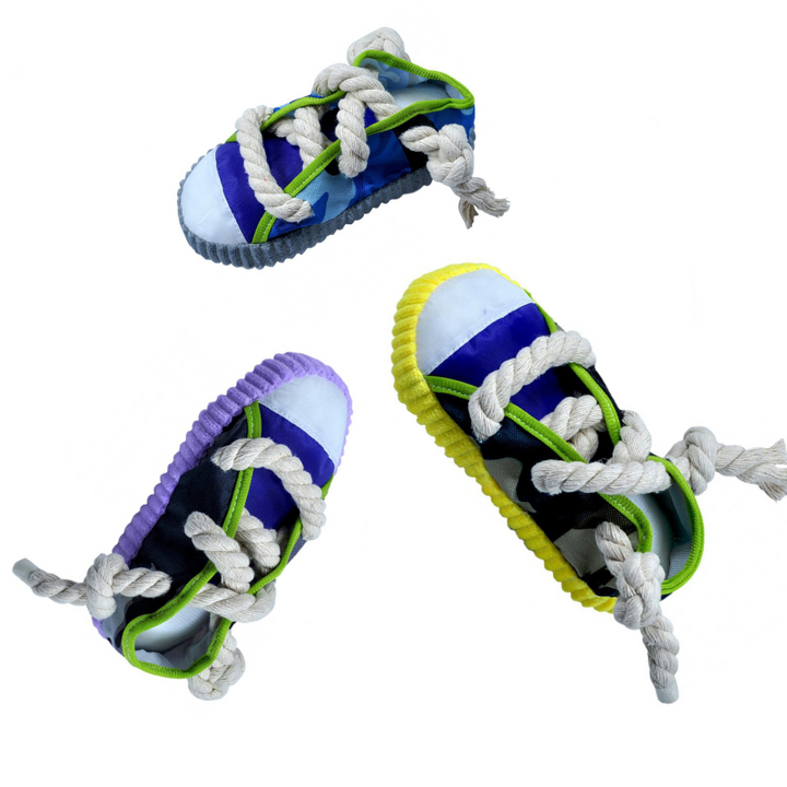 Tough, safe dog toy resembling a shoe, ideal for puppies and adult dogs needing a chew outlet.
