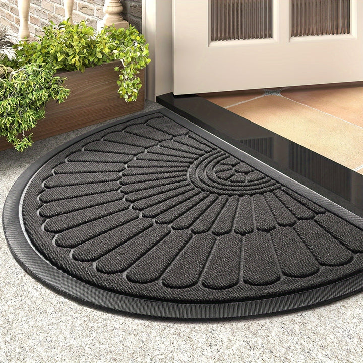 Non-slip half-round rubber mat for secure footing in any weather condition.