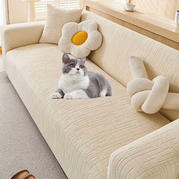 Easy-to-install jacquard pet slipcover instantly upgrades living room decor & protects your couch.